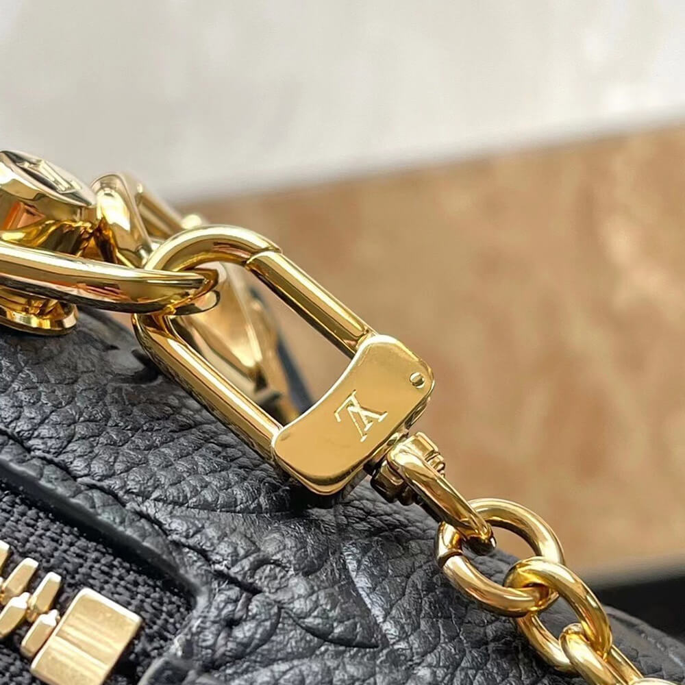 LV Petite Malle Souple Handbag