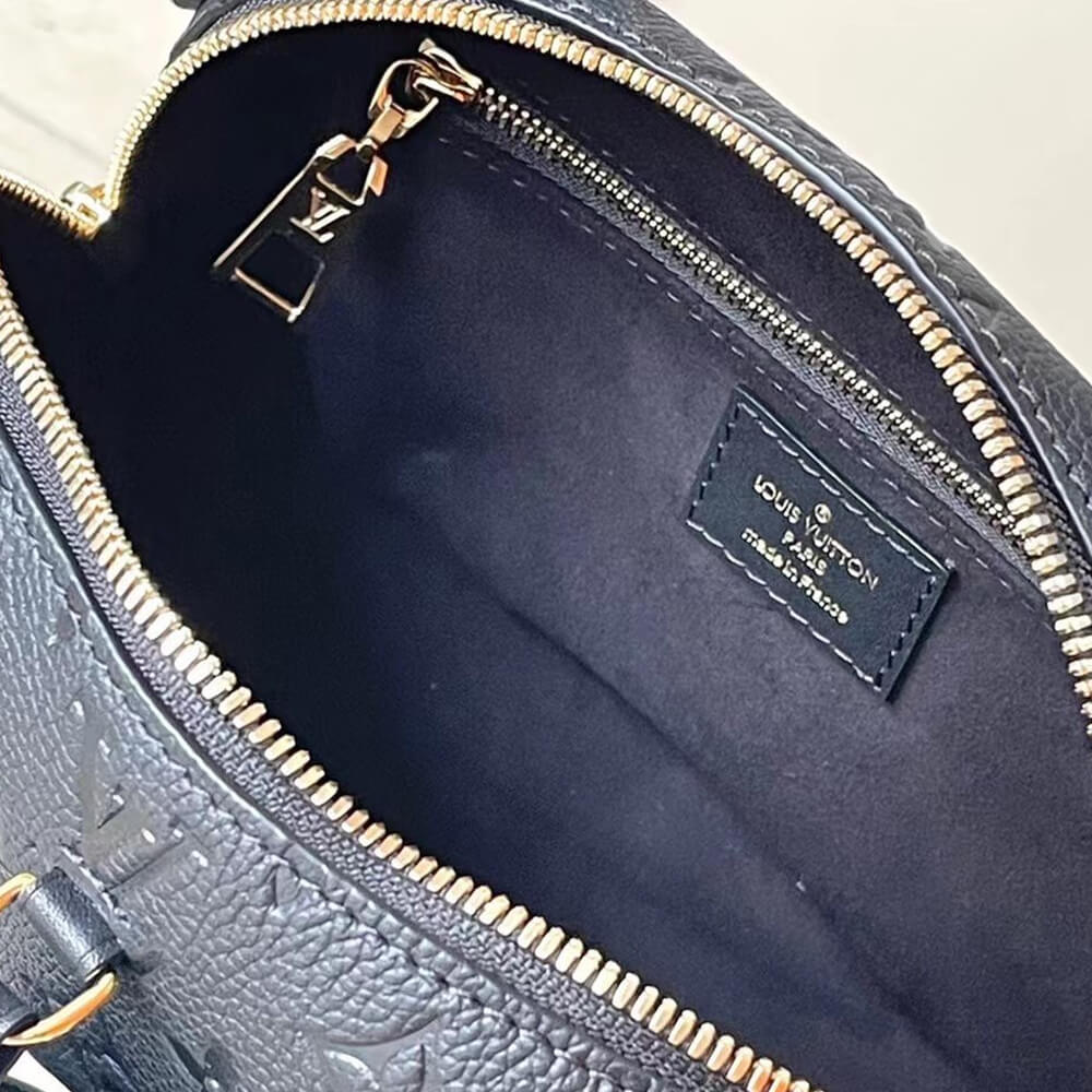 LV Petite Malle Souple Handbag